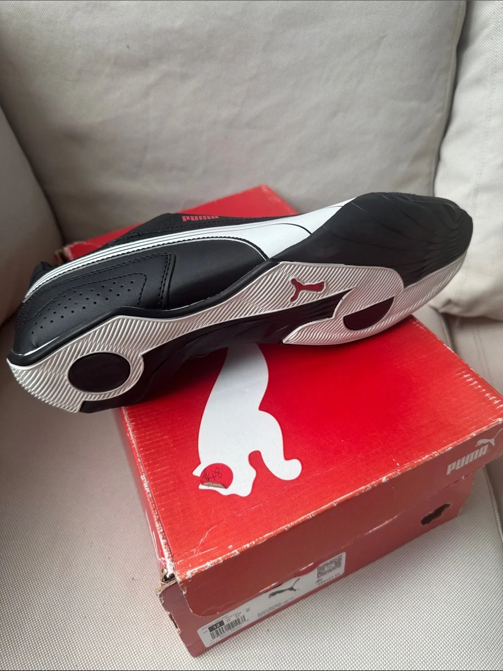 Puma Men’s Black Sneaker with White Formstrip and Red Logo